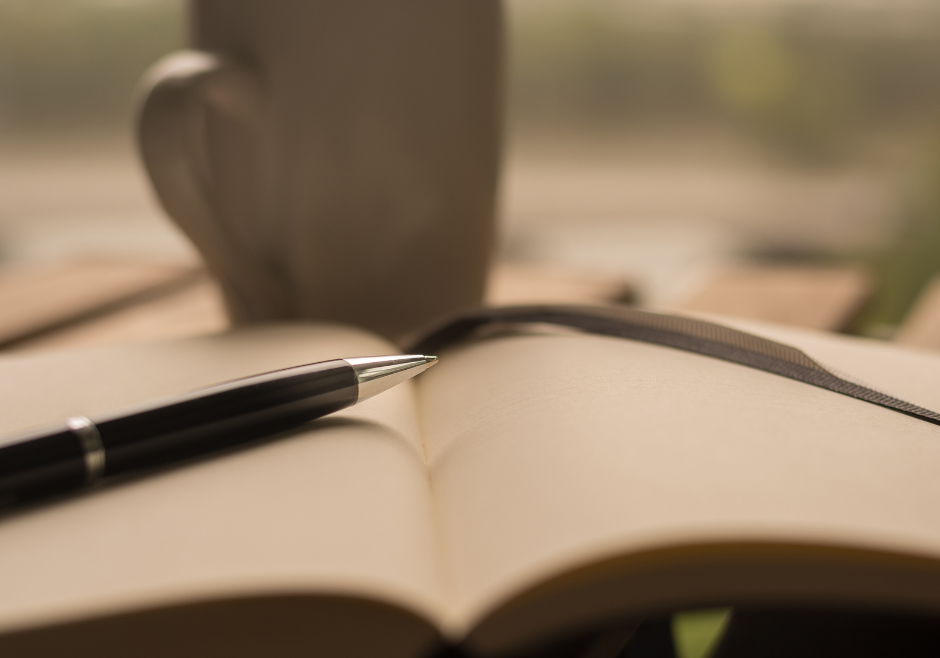Coffee cup, journal,, pen